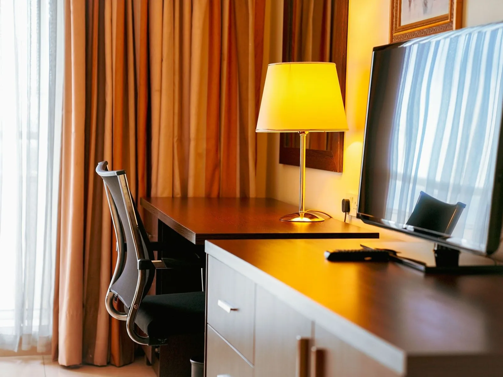 Diplomatic Suite desk and seating at Abuja Continental Hotel