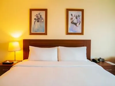 Superior King bedroom at Abuja Continental Hotel