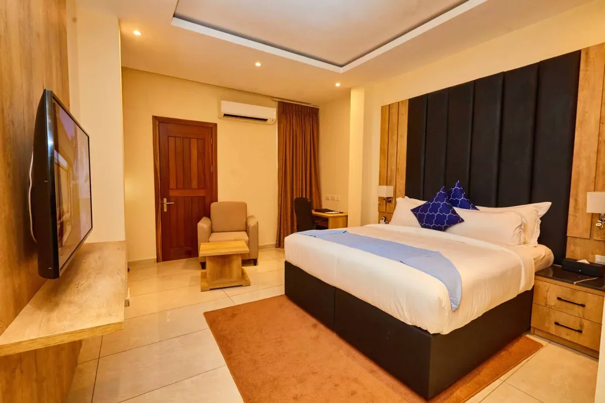 Guest room with desk at Vintano Hotel